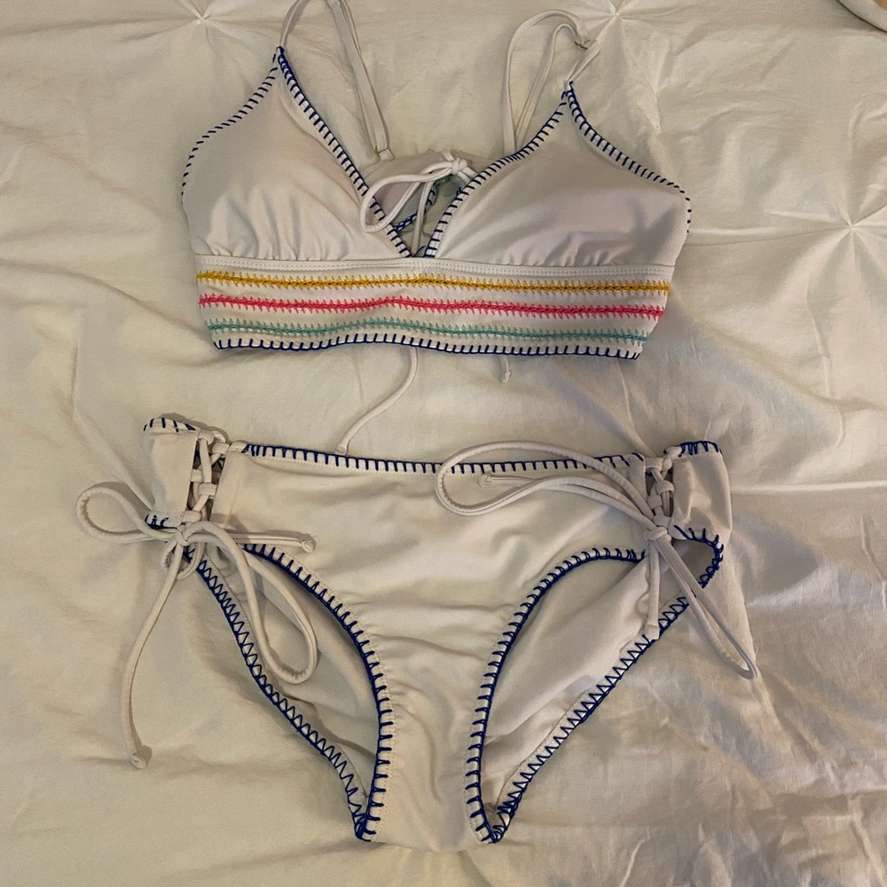 white bikini with some color